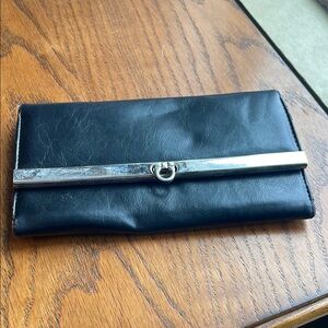 Chic Black Leather Clutch with Silver Accent